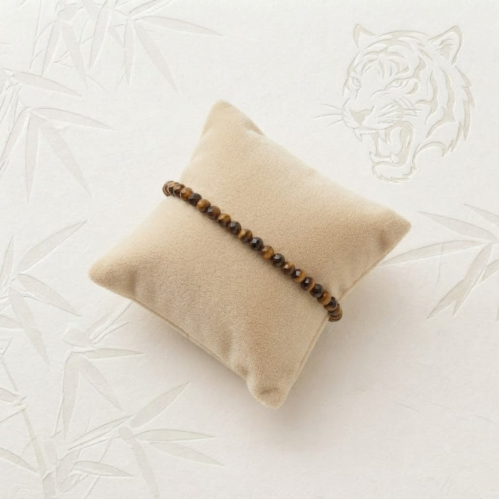 Damen Armband Elastisch 4 mm Tigerauge facettiert DAVUTA auf Kissen