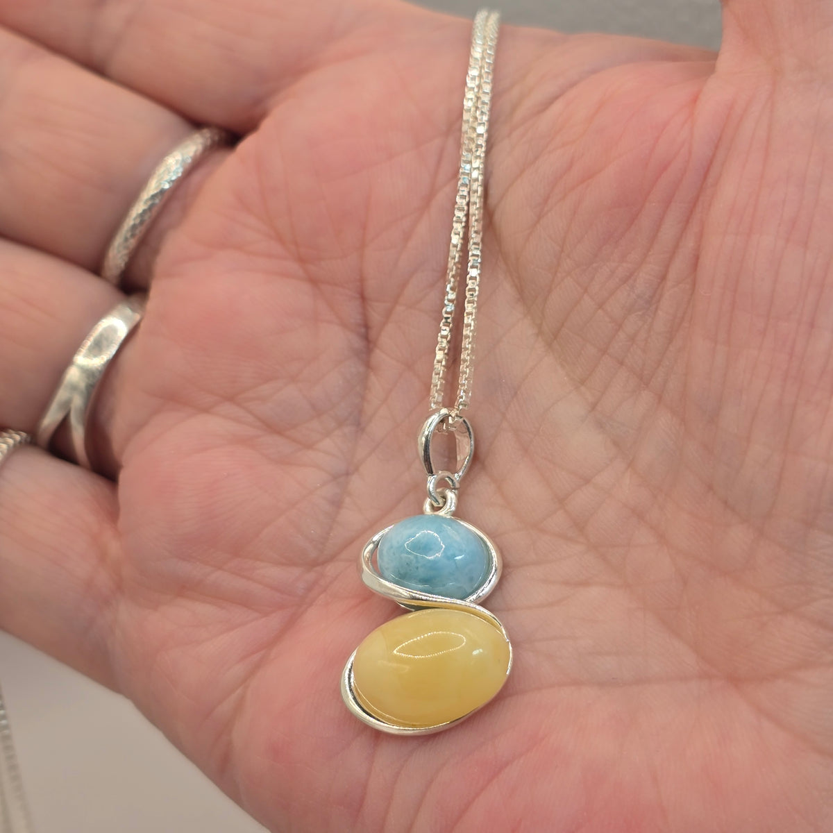 Damen Kette mit Anhänger Larimar Bernstein Silber an Hand by DAVUTA