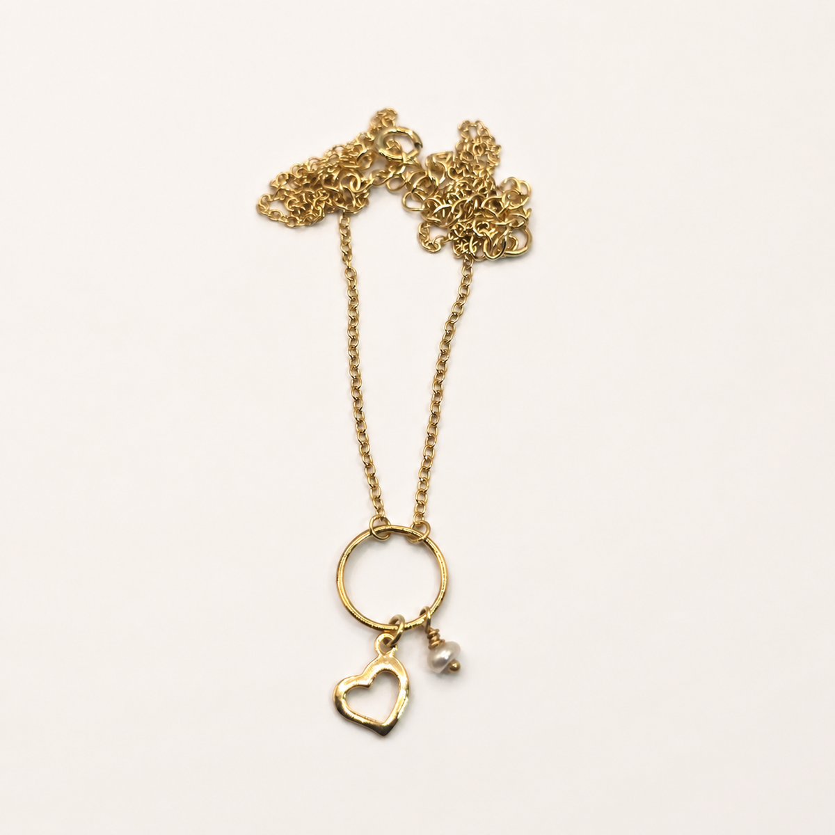 Damen Kette mit Herz, Kreis, Süßwasserperle liegend